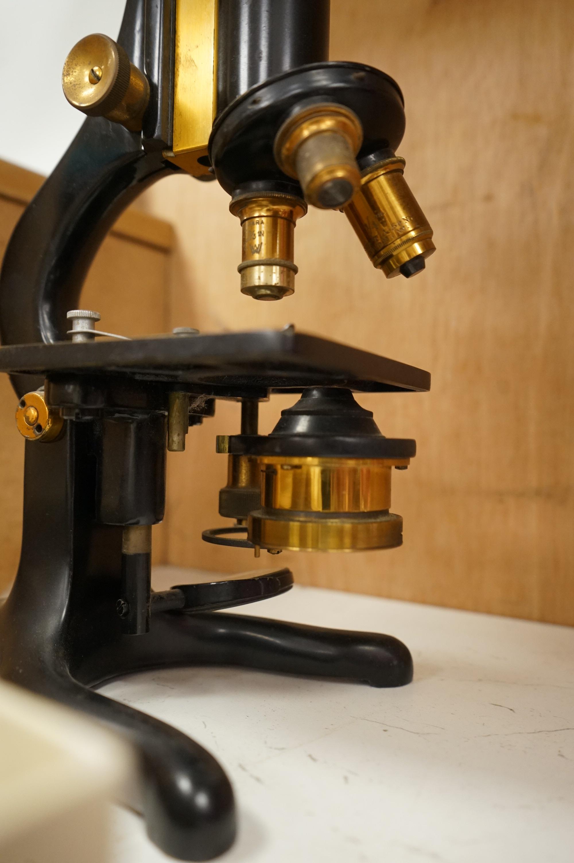 A parchment Indenture of Apprenticeship as a Surgeon and Apothecary between Nicholas Adams and Robert Seymour Adams of Hampshire, dated 1849, an early 20th century monocular brass microscope by W. Watson & Sons, 31cm hig